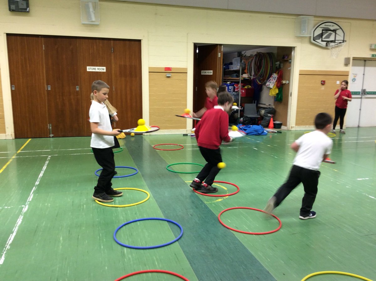 newmacharp4's tweet photo. This afternoon we learned some basic racket skills in tennis with P1FB. We incorporated these skills into fun relay games with excellent teamwork being demonstrated. Well done everyone for working so well together! @MacharNew https://t.co/2MAzFh0Lei