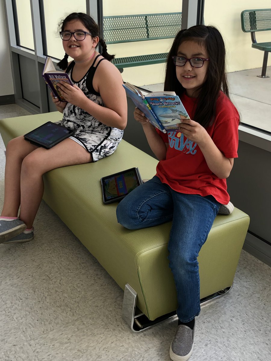 Lombardi Bears reading on the new hallway benches!  They are loving the extended learning space!  <a href="/lombardibears/">SCA Lombardi</a> <a href="/staciefleisch/">Stacie Fleischman</a>