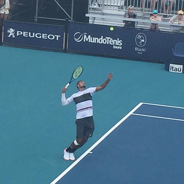 Opulenceintl's tweet photo. Nick Kyrios serving at 138mph.  High drama at the #miamiopen amidst smashed rackets Coric overtakes Kyrios in the third set. #worldclass #tennis #pro #miamiopen2019 https://t.co/L7SCJvdacd https://t.co/yC1SRj4ENE