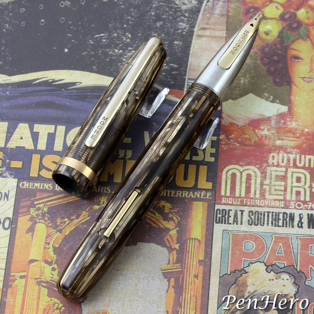 PenHero's tweet photo. Moore Fingertip lever-fill fountain pen in Autumn Pearl striped celluloid c. 1946-1950 
#pencollecting #fountainpen #moore #moorepen #fingertip #celluloid #penhero https://t.co/YDl4NdIddY