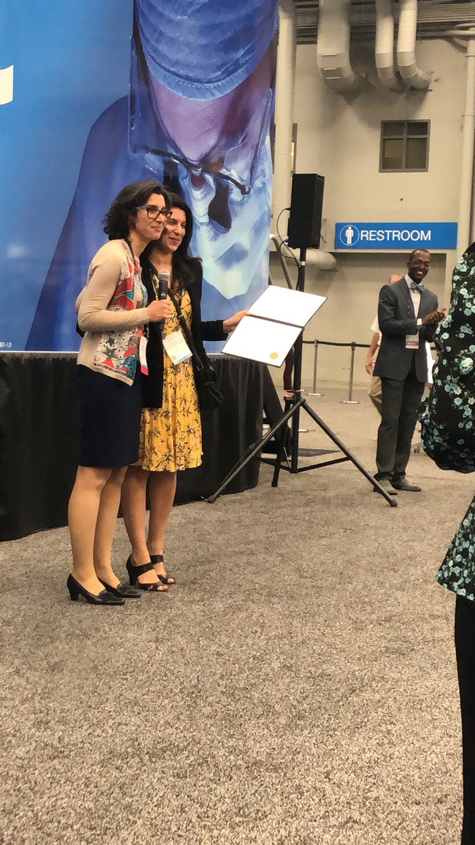 HannaJavan's tweet photo. My mentor Dr.Abi-Jaoudeh is announcing the best poster #SIR19ATX #IAmIR #WomenInIR #twittIR #UCI https://t.co/nf9fcebEkW