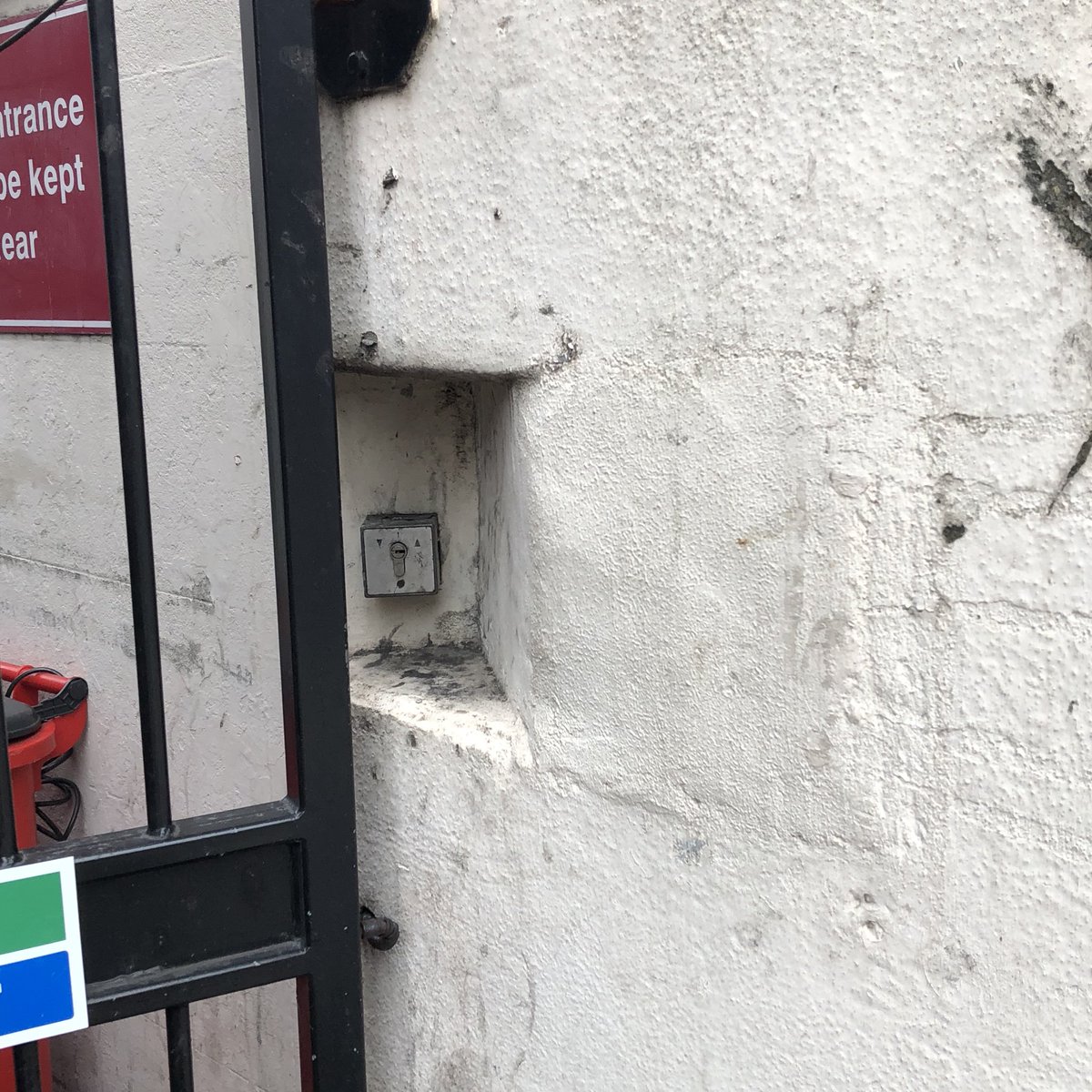 Even better, this concrete has two wide-angled loopholes in it. The right hand one has been completely filled in, the other left partially open for a handy security box cubby-hole. Armoured and loopholed - this is a fortified shop. A shop with a bunker built-in!