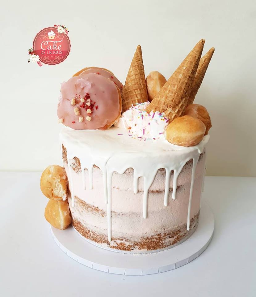 CakeoliciousUK's tweet photo. #krispykreme #celebrationcake #birthdaycake #seminakedcake #cakeolicious #dripcake #luxurycakes #raspberryandrosecake #londoncakes #bespokecakes #lutonbaker #lutoncakes #buttercream #desserts https://t.co/FFJTErbINC