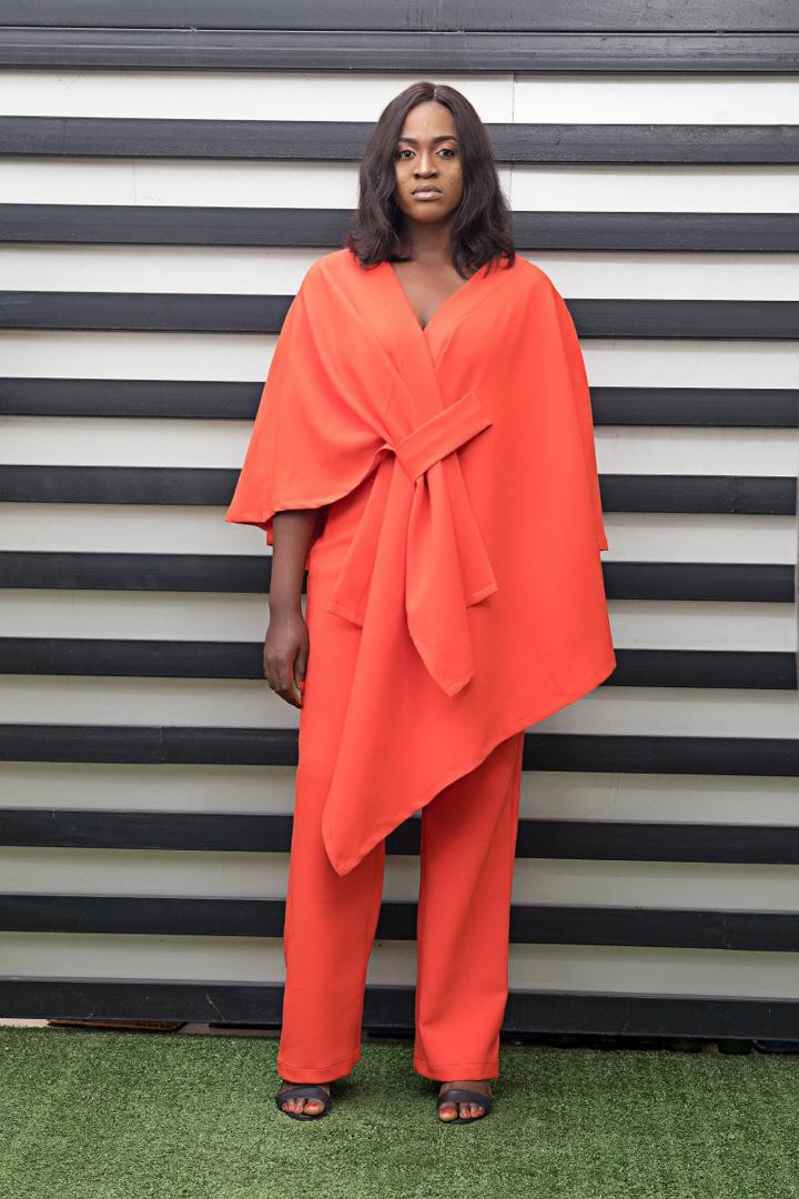 AsakeOge's tweet photo. Holala...Today is beautiful and we've got something bright to spark up your day...Orange drape cape with pant. 
Reach on 09098888244 OR visit us on https://t.co/w7vPwcvYc8 https://t.co/HHtZADdmE7