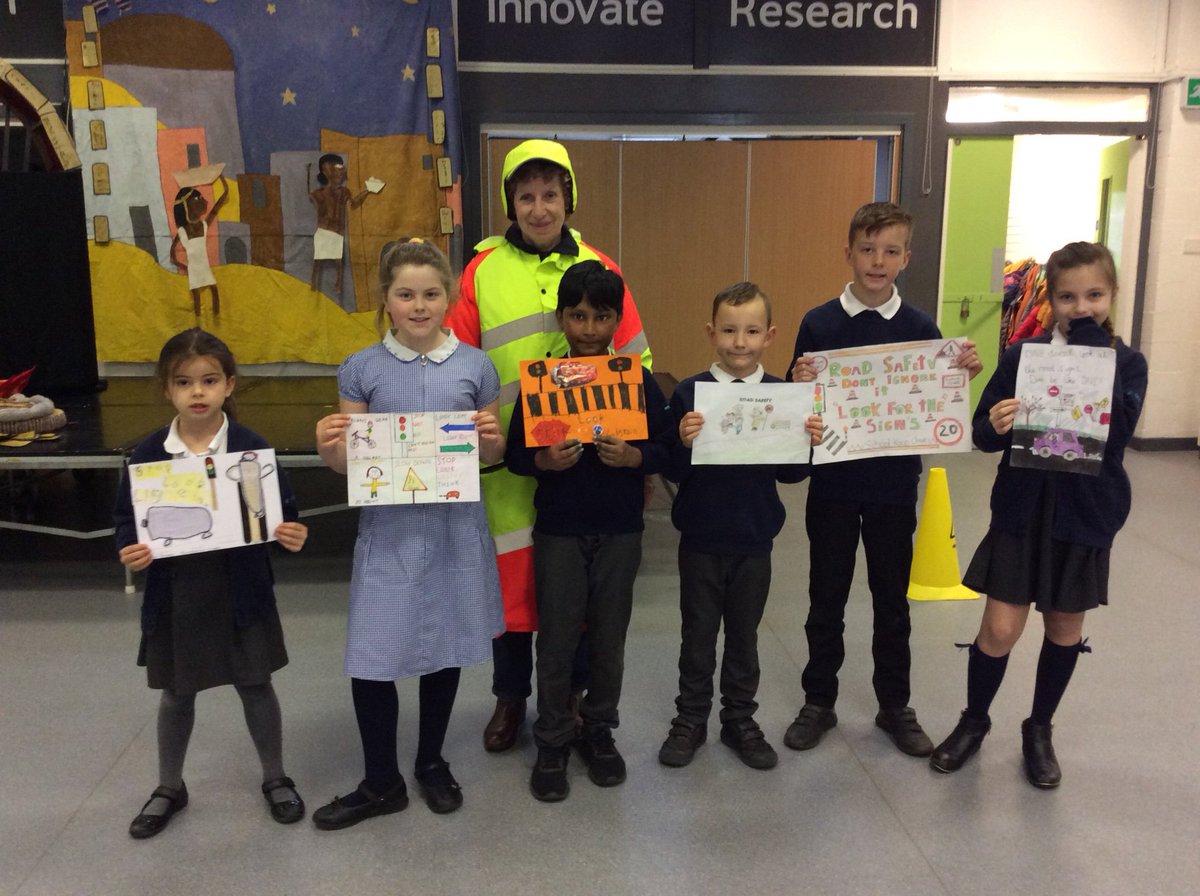 Judging the school council’s road safety poster competition with our crossing lady Mrs Jackson.