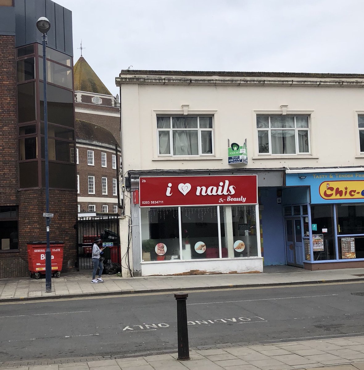 Geeky thread warning. Or, if you’re like me, a cool bit of 20th Century urban archaeology. Check out this shop in Kingston. What’s unusual about it (aside from its no-doubt-excellent nails service)?