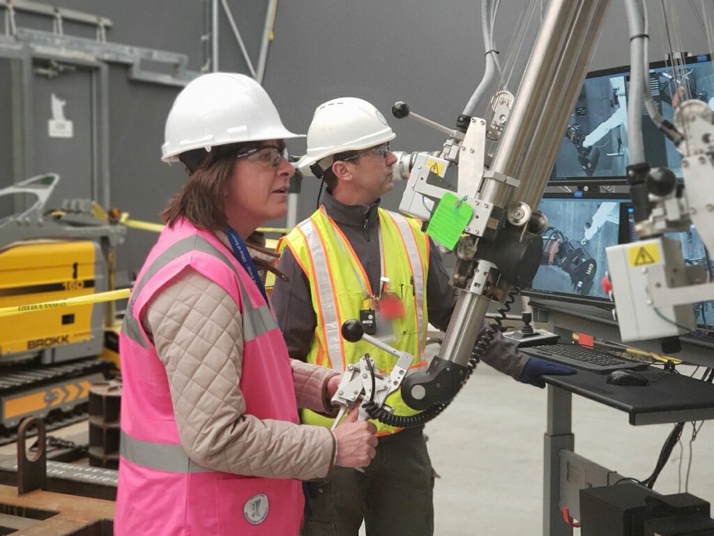 HanfordSite's tweet photo. EM Assistant Secretary Anne White gets some hands-on training on a remote operating system being tested at the 324 Building mock-up during a tour of the #HanfordSite today. @ENERGY @EMAssistantSec https://t.co/Lcs58QvRrt
