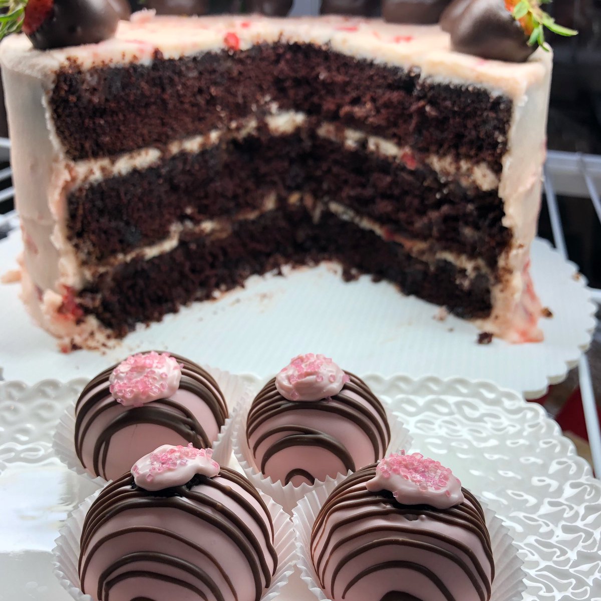Strawberries and chocolate make such a good combo! Try our strawberries n’ cream fudge cake as a slice or truffle! #dessert