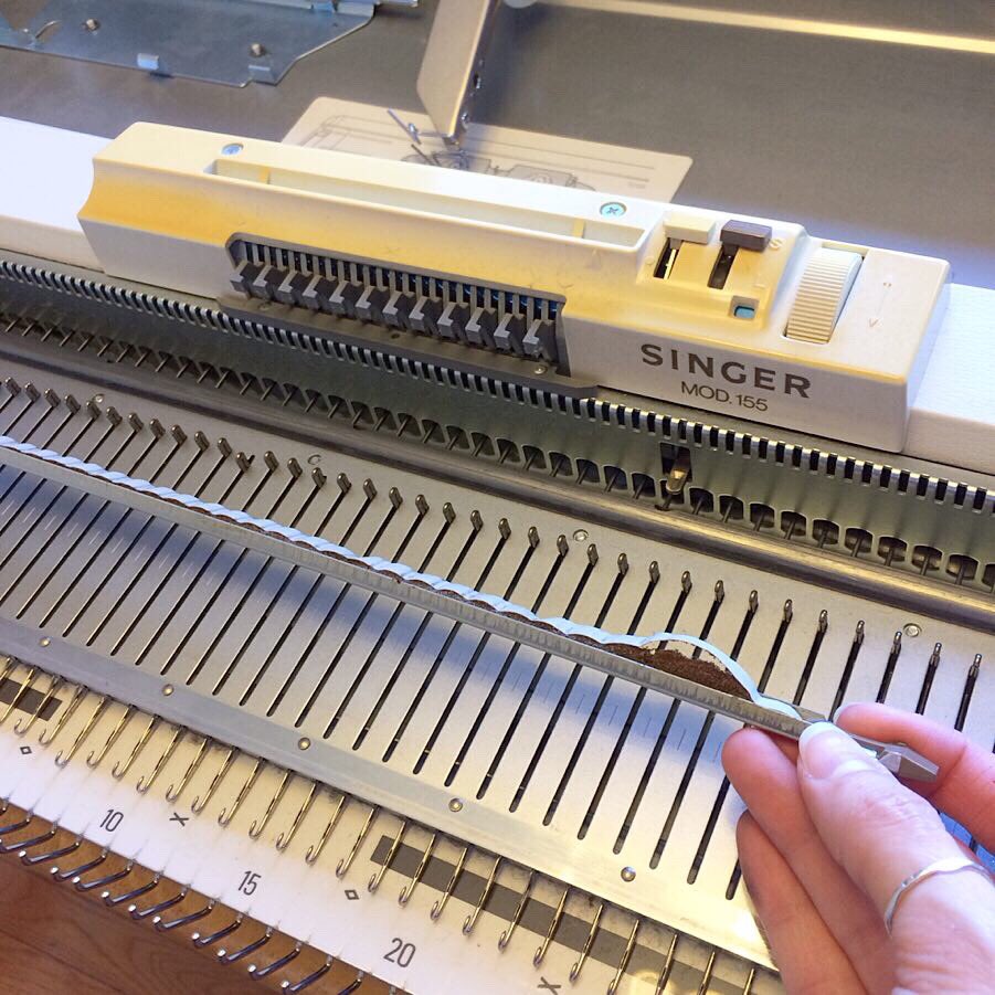 machineknits's tweet image. This Singer MOD.155 probably hasn’t been used in at least a couple of decades. First thing to check on the needle bed is the sponge bar. Check out old vs new! There’s also a lot of yarn around the wheels of the sinker plate.

#knittingmachine #knitting #singermachine #RochesterNY