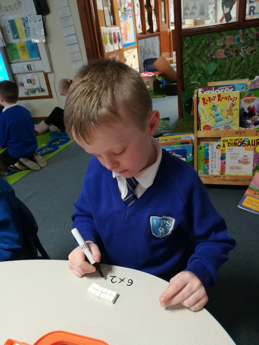Sarah_Shanks_'s tweet photo. In P2 we used Cuisenaire rods to help us understand area. We explained using a maths fact our representation. https://t.co/QHsEFWY2PR