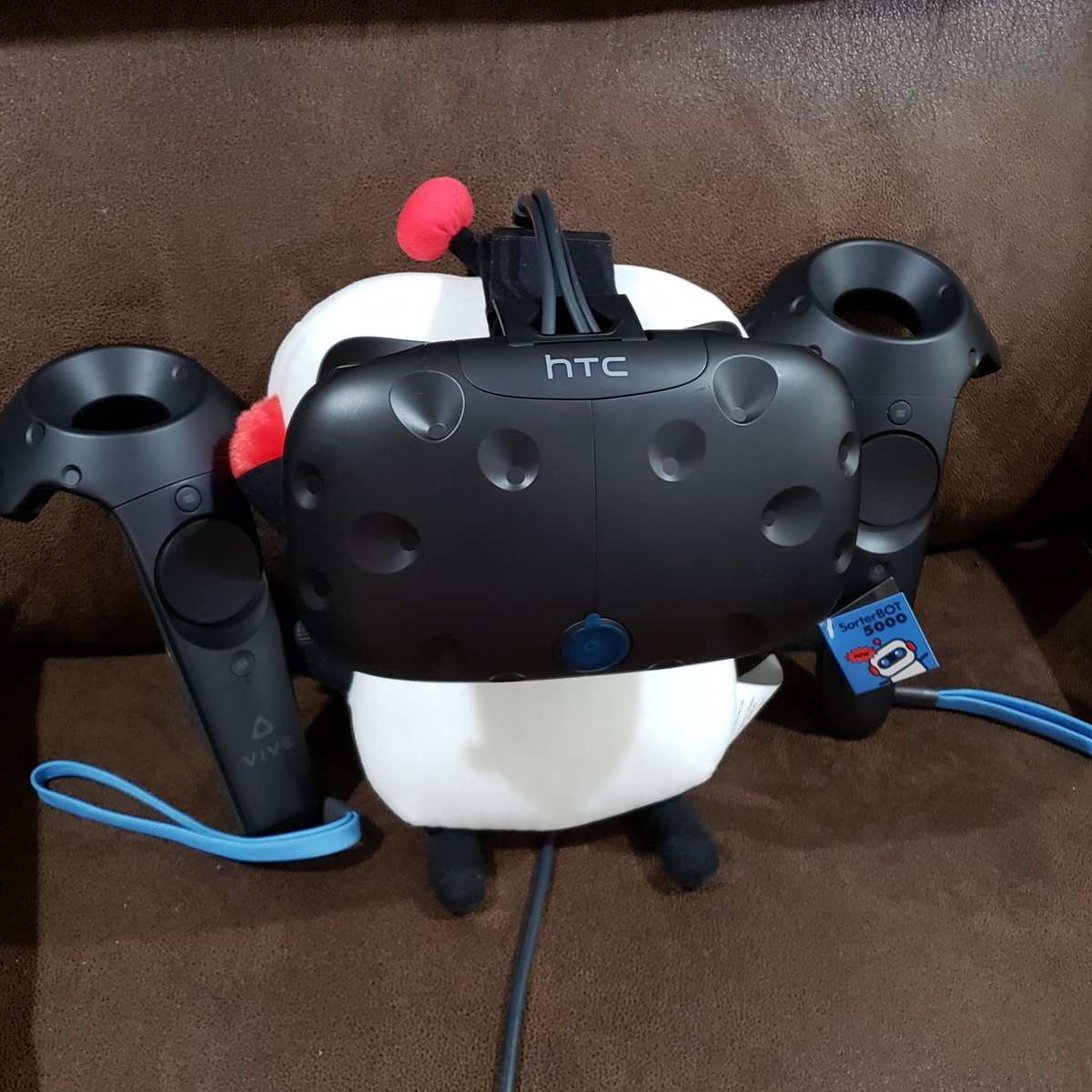 wk057's tweet photo. Got this Sorter Bot from @cgpgrey! Was decided he was just way too cute to stay just a Sorter Bot, so we've put him in extensive VR training to become the best #SnuggleBot instead! 🤖🥰 #VRTraining #HTCVive #MachineLearning #HumansNeedNotApply https://t.co/5fQVlis0wA