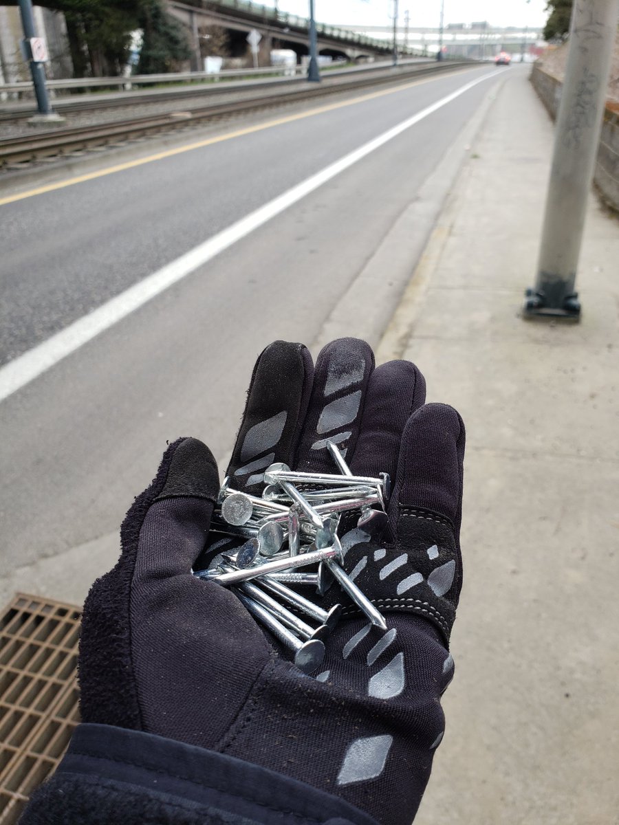 Picked up a patch of nails this morning and counted exactly 20. I thought that would be a good amount to donate to a bike-related cause. Ideas? #lemonadeoutoflemons Reported to @PDXReporter. <a href="/BikePortland/">BikePortland</a> <a href="/ChloeEudalyPDX/">Commissioner Eudaly</a> <a href="/PBOTinfo/">Portland Bureau of Transportation</a> <a href="/PortlandPolice/">Portland Police</a>