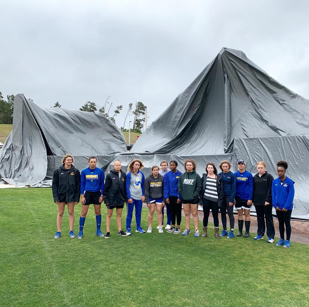 ERAUSoftball's tweet photo. This is not a photo back drop, but a tarp catastrophe. Mother Nature wasn’t working with us today, but we learned we can’t control her. Better luck tomorrow. #Team7 #GoEagles #BTE #OnePercent #RIPtarp #WeWillMissYou #CallCoachKelsi #HowInTheWorld #WhatJustHappened 😫💙🦅💛 https://t.co/9LHUheU7j2