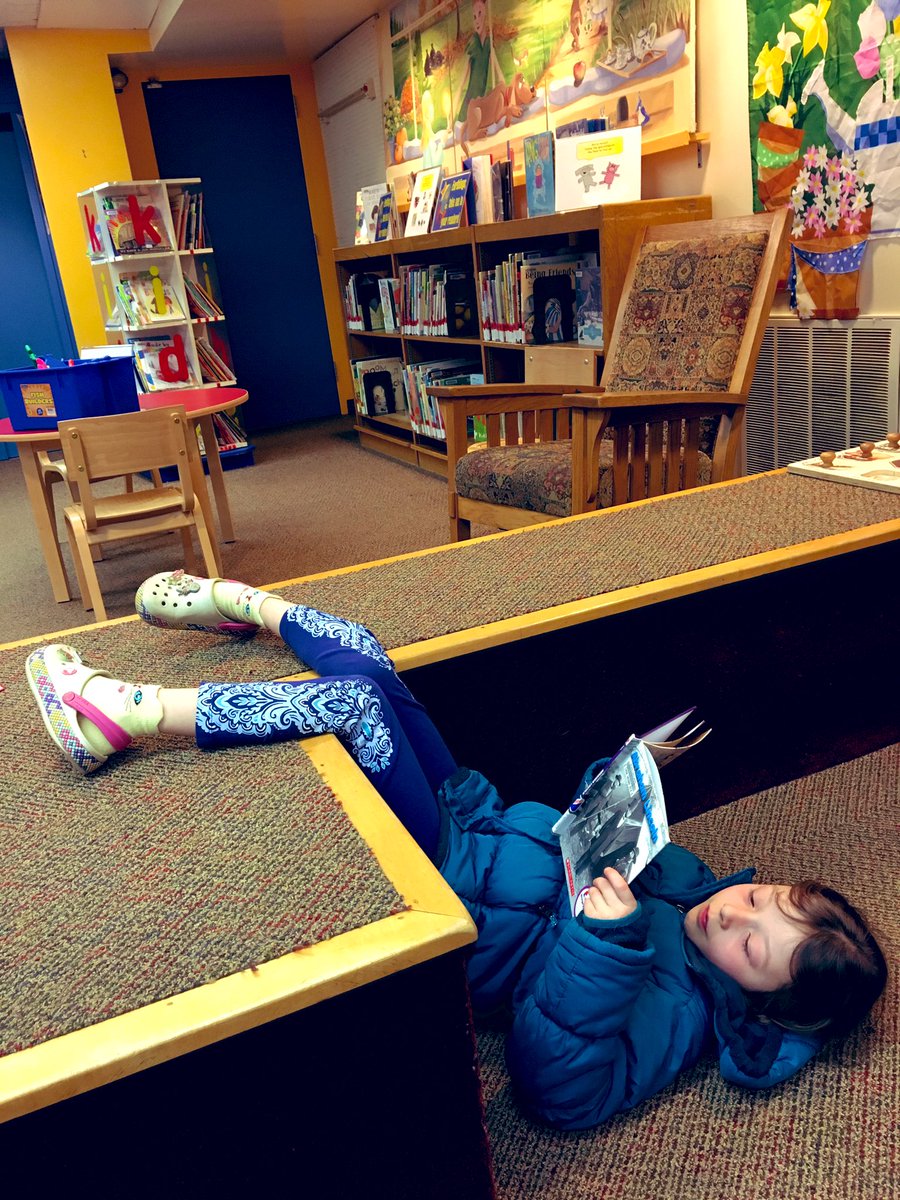 Jippolito's tweet photo. Just chilling here @MELROSELIBRARY learning a bit about our favorite president, Abe Lincoln β βWhoa, this is a really good book. It has fast facts! Did you know Abe would lie upside down against trees, like this, to read!?β #1stgrade #joyfulreader https://t.co/ck9eQC3vhY