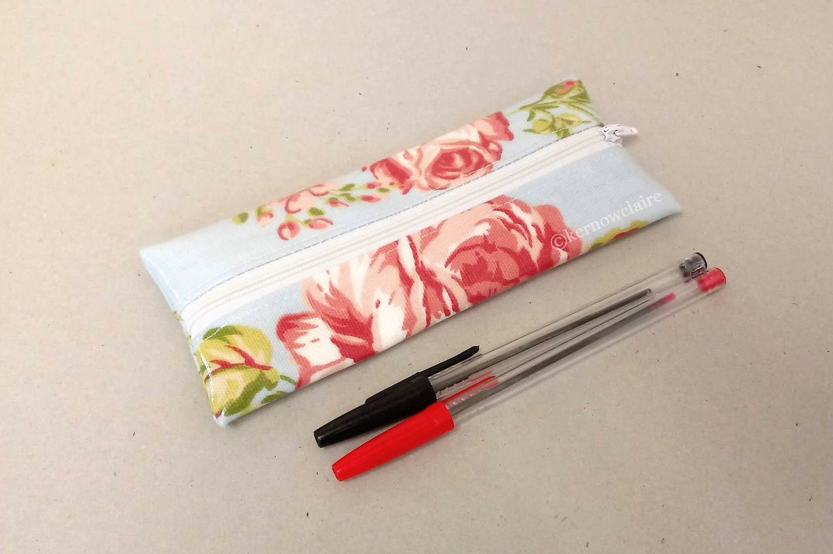 Brand new. Blue pencil case with pink flowers pattern, central zip, skinny style. A lovely gift idea.  #handmade #pencilpouch #shabbychic #giftforher #smallbiz  buff.ly/2U29waS via @Etsy