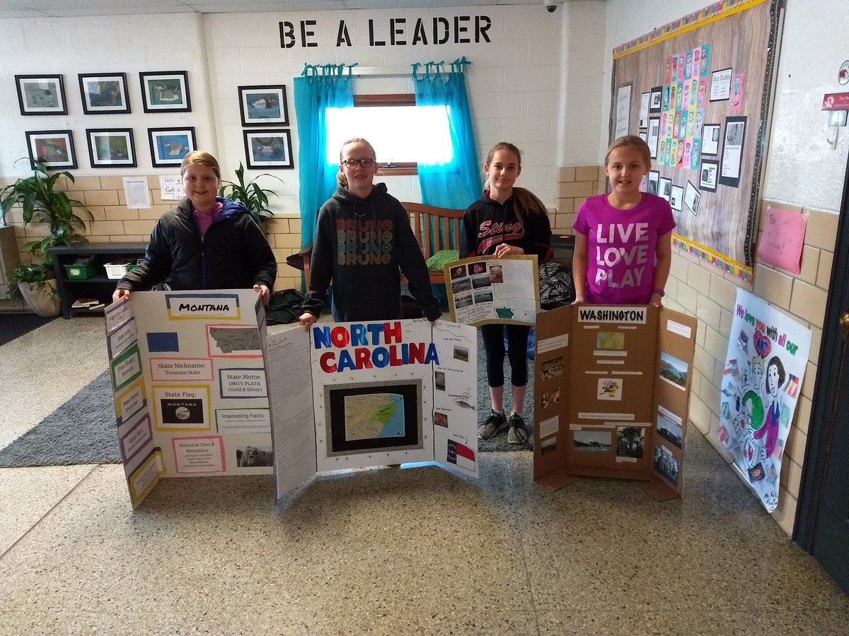 Showing off their projects. Great job students.