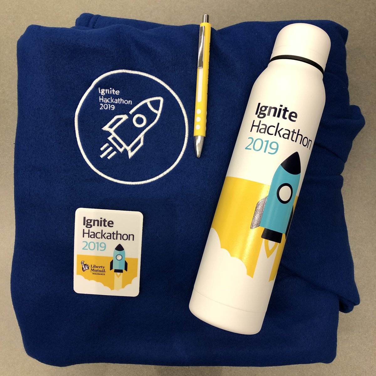 Liberty_IT's tweet photo. In case you missed it, our swag is all environmental friendly. This year we have upped our game & have snuggies, cooler water bottles, stickers & of course the classic pen! #IgniteHackathon2019 #TechAtLiberty https://t.co/txvxGSz4dg