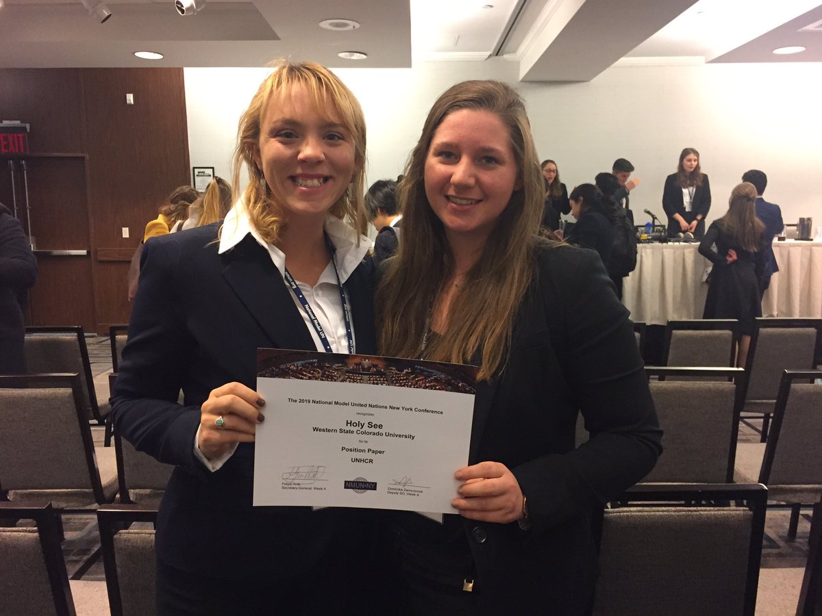 WesternModelUN's tweet photo. Morgan and Maeve with WCU Model UN Holy See Position Paper Recognition Award 2019 @WesternColoU @UN @Pontifex @WesternModelUN https://t.co/Y5LsYB6mFL