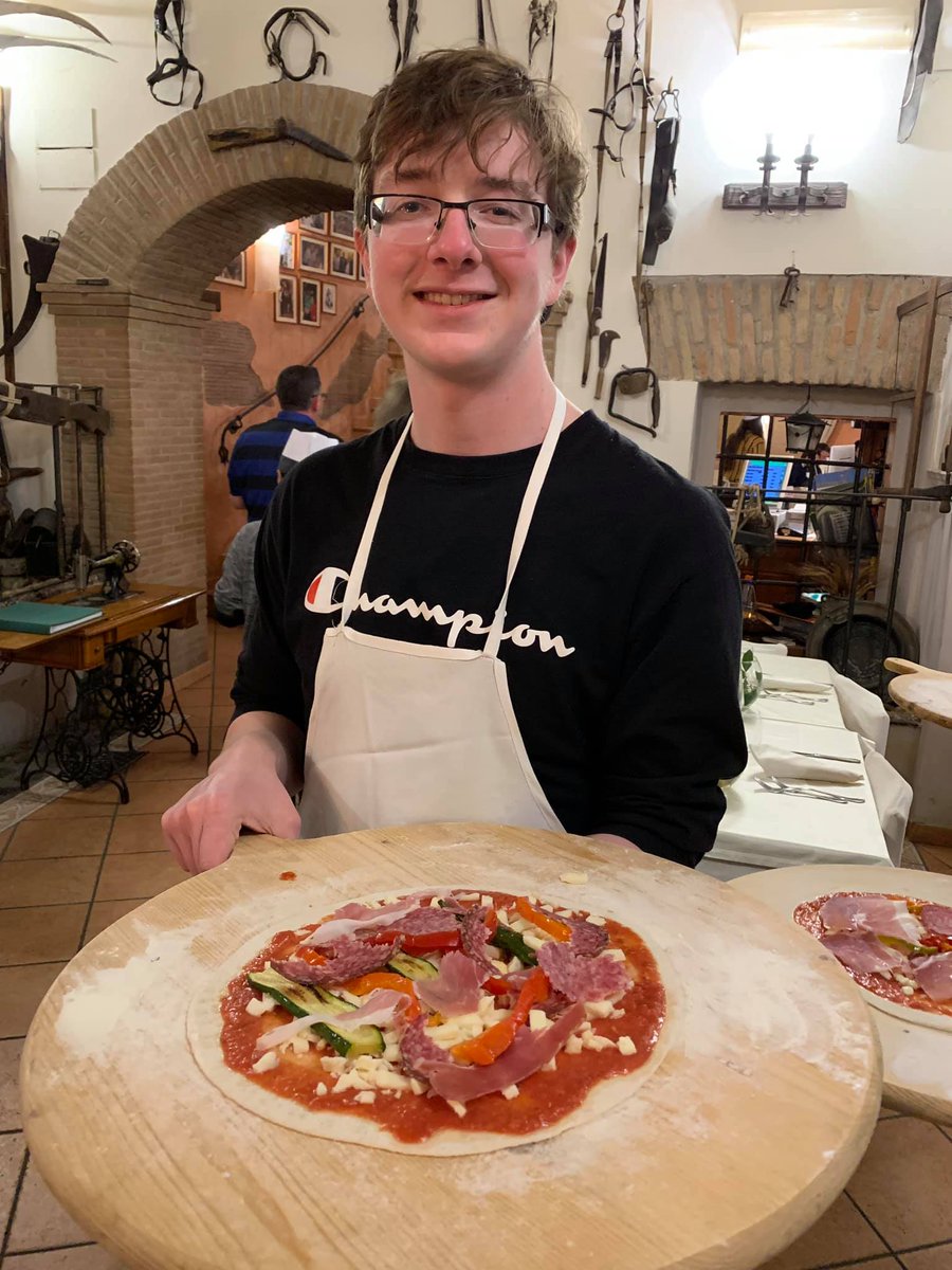 wlschools's tweet photo. Making our own pizza last night in Rome! #TrojanPride #SwIFR https://t.co/wQXH981lMa