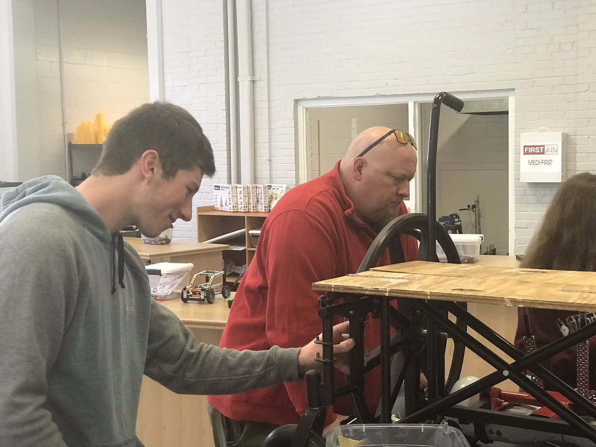 MrBates14's tweet photo. You know it’s real when you get your principal involved @SHSHornetNation students and principal Luke Brown working on the #hoverchair project! We are #hornetnation #shscte @CTEforNC @RSSinformation @RSS_CTE @brinkleyrowan @pirate_shane @a_p_johnson @DefinedSTEM https://t.co/EIrayfIy4f