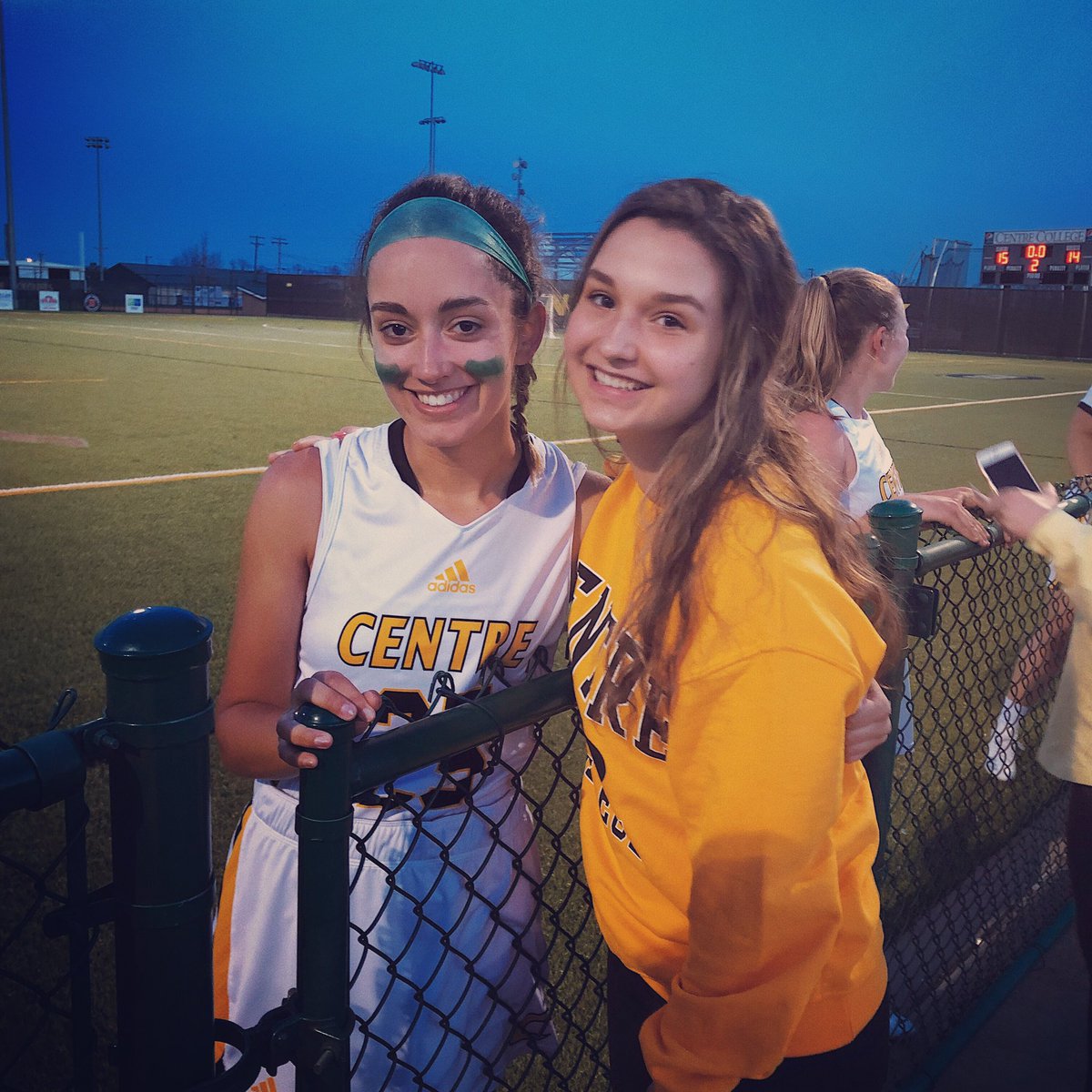 CALGirlsLax's tweet photo. Freshman Attacker AC Reding cheering on big sis and former CAL Laxer Sloan Reding. Congrats @slooany on the win tonight!!! Centre 15 Transy 14. #CALLAX https://t.co/ObyRtTyrmG
