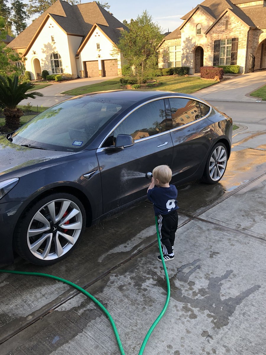 LetoRussell's tweet photo. Daddy’s little helper appreciates the Model 3 as much as I do!! Thanks @Tesla @elonmusk https://t.co/C7I3lZPOd2