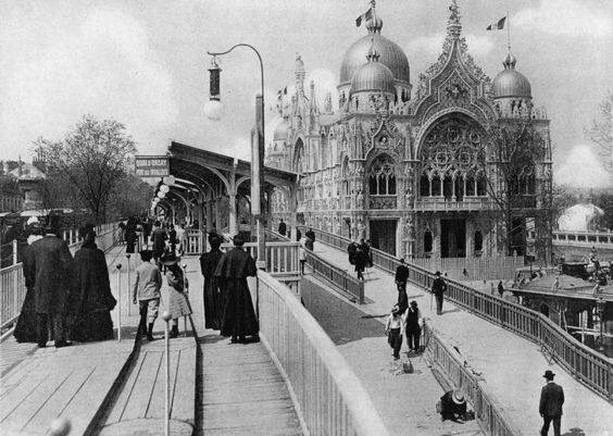 The far left walk way is a moving sidewalk in Paris. But check out that magical architecture.