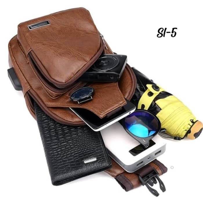 duniadompet's tweet photo. Tas selempang slempang pria kulit usb charger port murah SI-5 https://t.co/KzECPWQ2rC https://t.co/ev1EaB2eZA