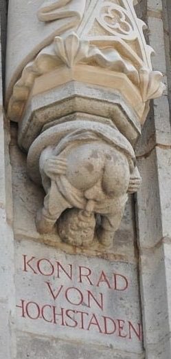 On the walls of Cologne City Hall, hidden under a larger statue of Archbishop Konrad von Hochstaden,  is a carving showing a man giving oral sex to himself. It dates to around 1410 and no one really knows why it’s there.