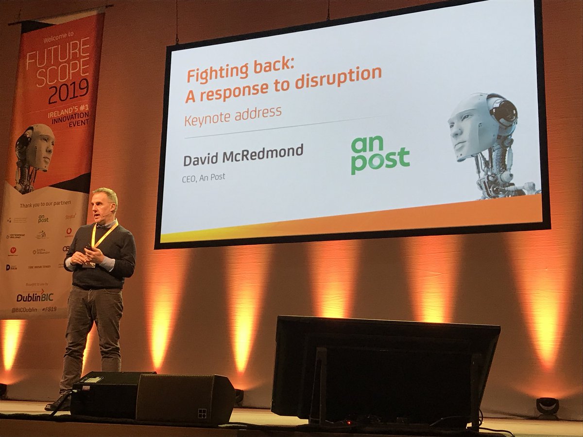 burkehelen's tweet photo. David McRedmond, CEO An Post speaking how An Post has to revolutionize the way products are delivered #fs19 https://t.co/xsaybtTAav