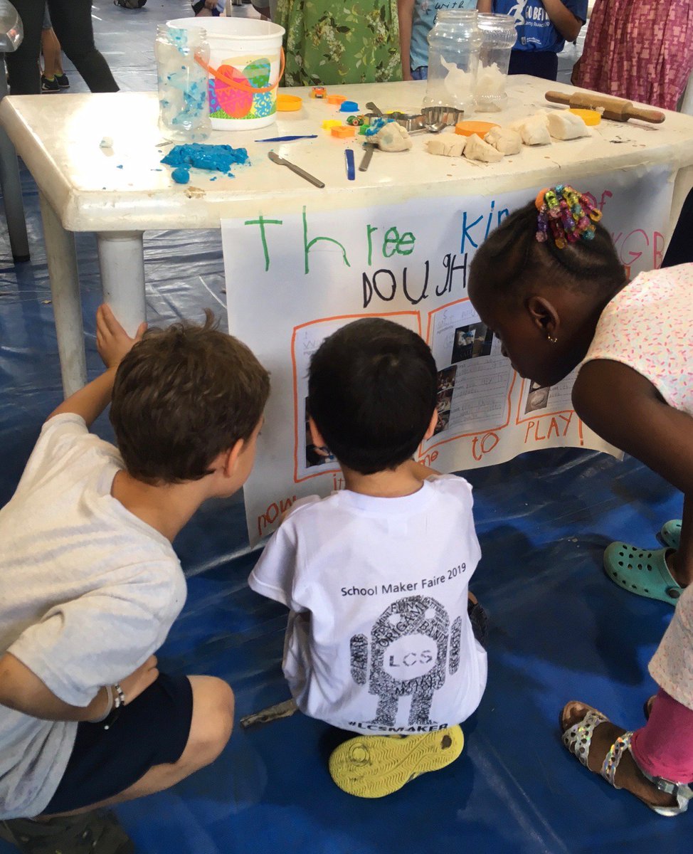 LCSGhanaMS's tweet photo. Maker Faire still happening at LCS! This young exhibitor (center) reads from his poster to teach his visitors about three kinds of play dough. #LCSroar #LCSLearns #LCSConnects #LCSMakerFaire https://t.co/VLsQnraAkI