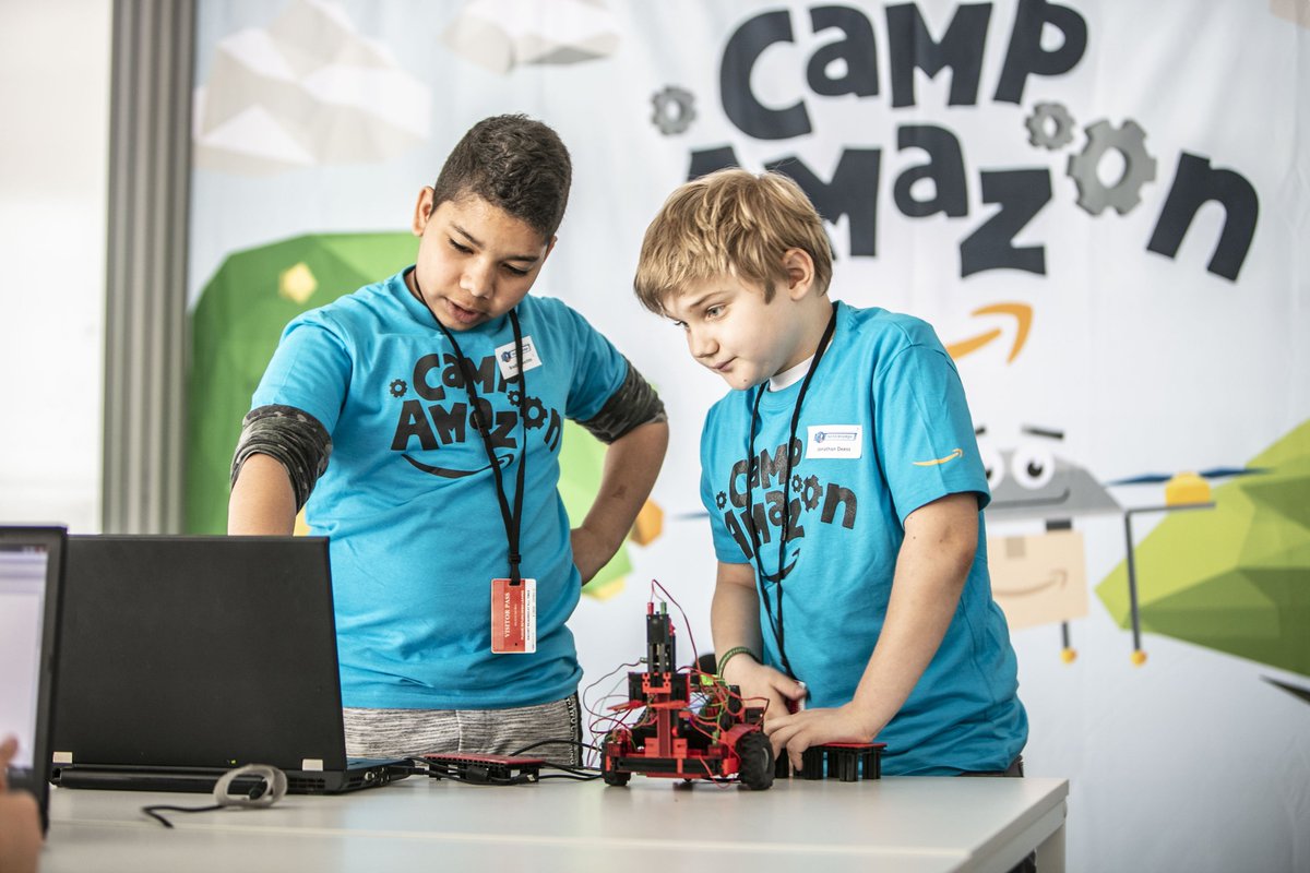 AmazonNewsEU's tweet photo. More than 40 children participated in technology experience camps at Amazon #Pforzheim. With @unikold technical camps students, they built small forklifts and looked behind the scenes of the logistics center #deliveringsmiles #CampAmazon, [DE] https://t.co/9npgCpHRaF https://t.co/CoaehhvghT