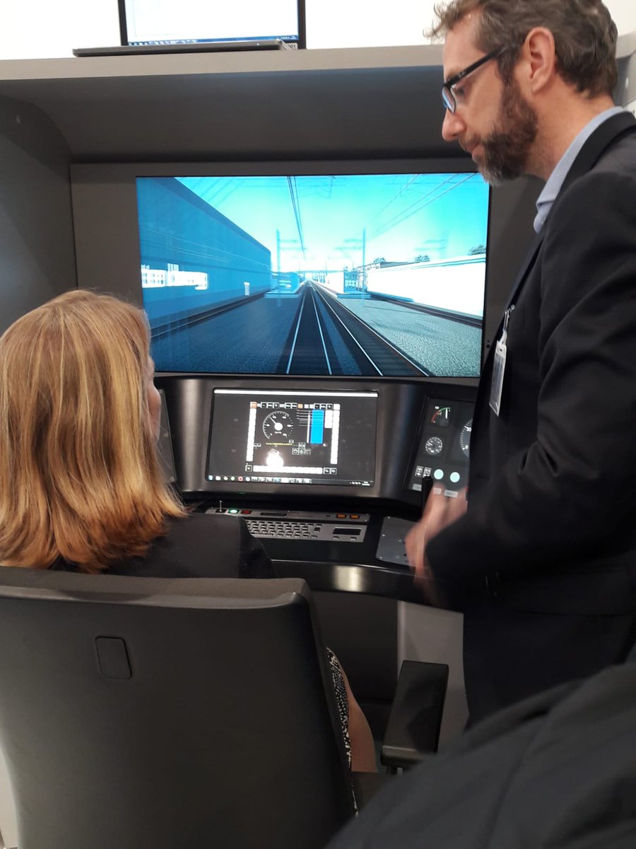 Alstom's tweet photo. Hello from @railtecheurope ! We were delighted to showcase our ATO simulator to @SvVeldhoven from @MinInfraWaterNL. Discover  our ERTMS solution, HealthHub, Mastria, our PrimaH4, Coradia iLint @Aptis_Alstom &amp; @Station__One on booth 2.002 ! https://t.co/cDKKh1Q0Tp   #RailTech2019 https://t.co/gfETCjutOO