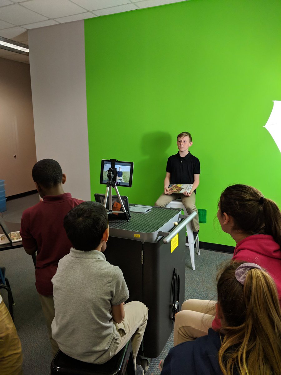 Using the green screen to create our book talks!  So proud that my students are working together to record each other's videos!  <a href="/GQES_Dragons/">GQES_Dragons</a>