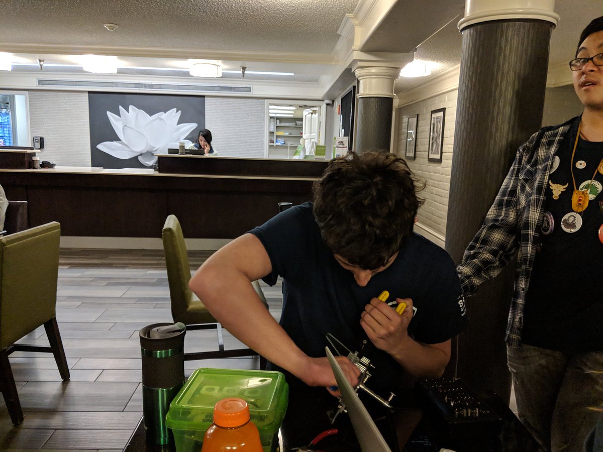 Team_5678's tweet photo. Early morning repairs before inspection today! #OMGRobots https://t.co/GzdtiAL8oE