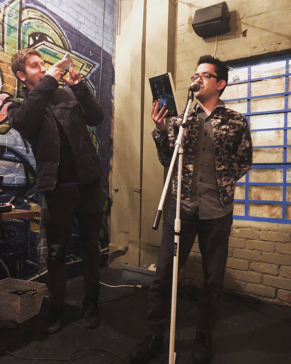 chriszeischegg's tweet photo. 1 more from Monday night, courtesy of @tristanreveur — @mjseidlinger reading from #BodyToJob — we were going to try to trade off reading this story. It didn’t work. I just look like an asshole in this 📷. but social media is all about looking like an asshole — buy Michael’s 📚 https://t.co/c7JfWoFwwd