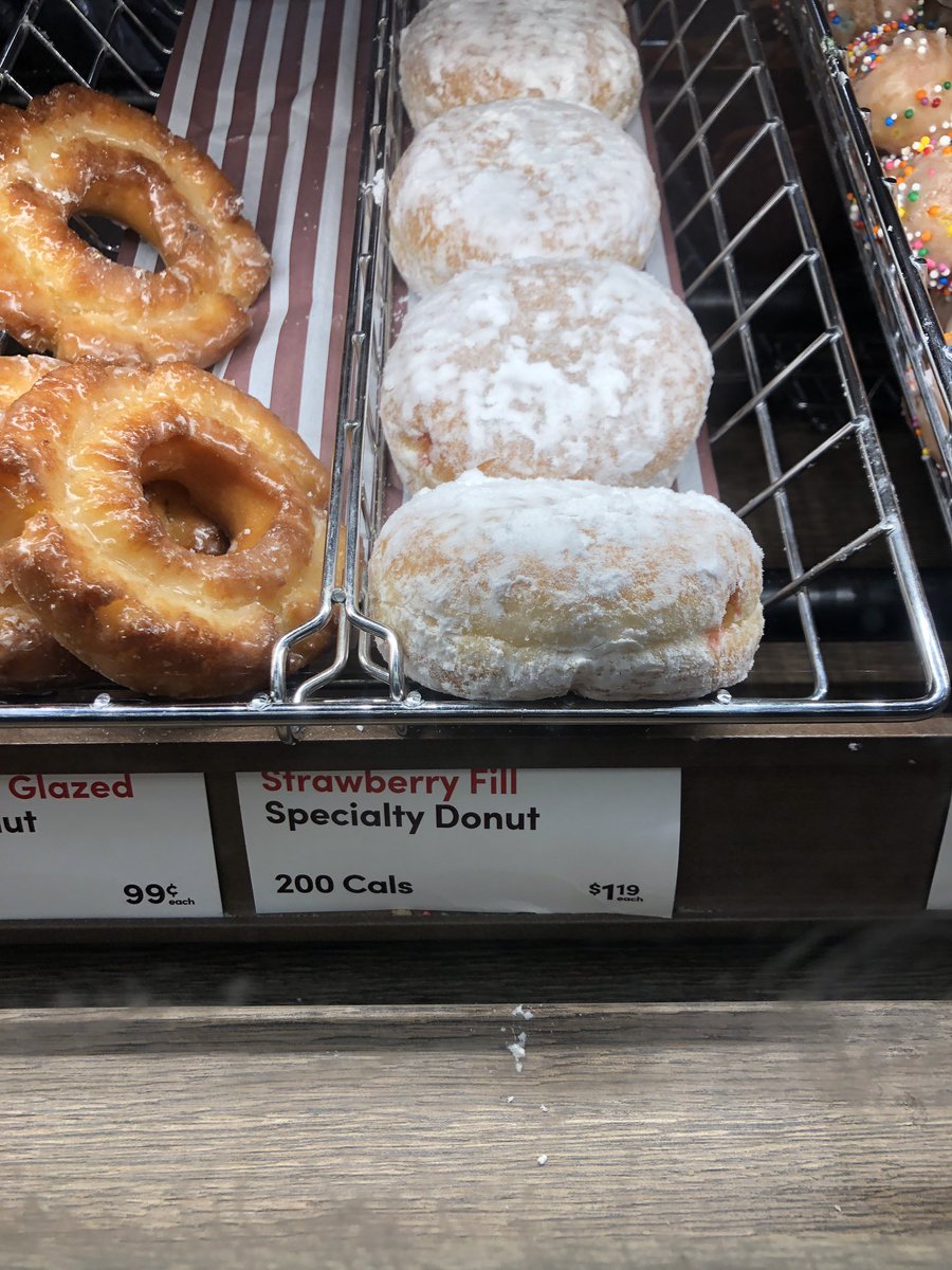 mackinc's tweet photo. The jelly doughnut is now considered a “specialty” doughnut?!? C’mon @TimHortons! 🙄 also, this is Canada! Check your spelling! https://t.co/MxiXhiNGLO
