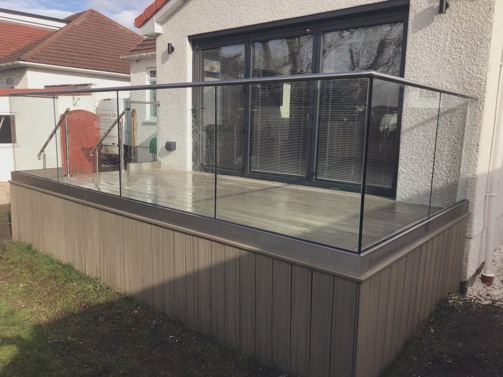 AlbaLtd's tweet photo. Another Frameless glass balustrade completed in Glasgow on composite decking. 
This one topped off with integrated stainless steel top rail. #glassbalustrade #glass #compositedecking #stainlesssteel #balustrade https://t.co/Min5pMu5OE