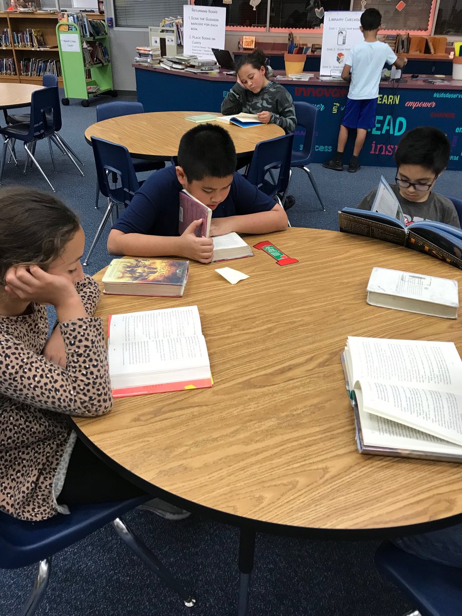 We enjoy checking out books!  We really get into them! ⁦<a href="/GleasonFifth/">5th Grade at Gleason</a>⁩ ⁦<a href="/GleasonElem/">Gleason Elementary</a>⁩ #cfisdspirit