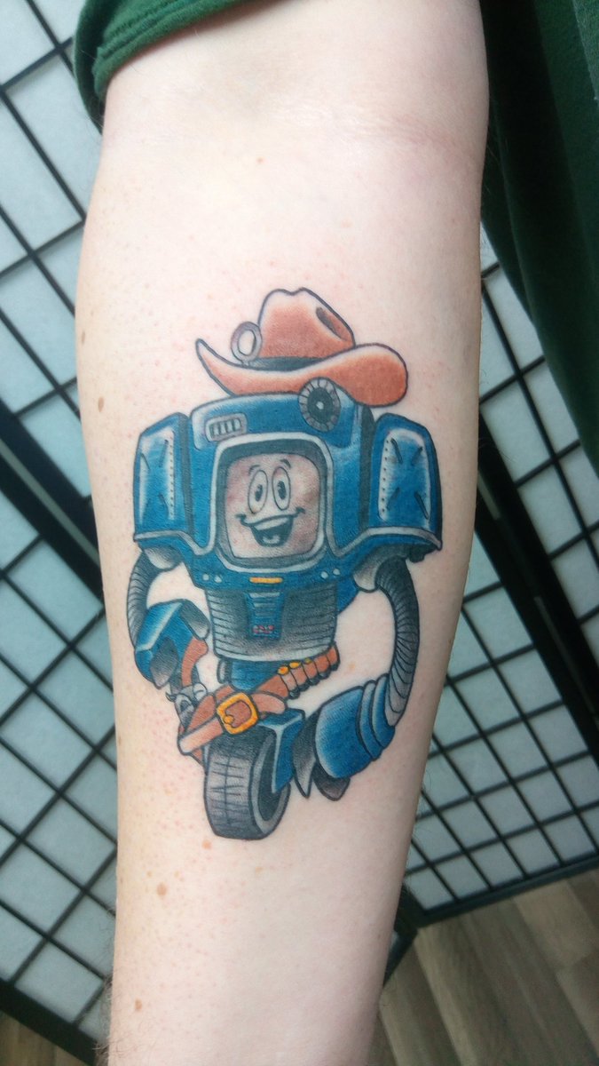 BiglosGaming's tweet photo. Got my first tattoo done today it's Yes Man from Fallout New Vegas https://t.co/3kzDg6rCAM