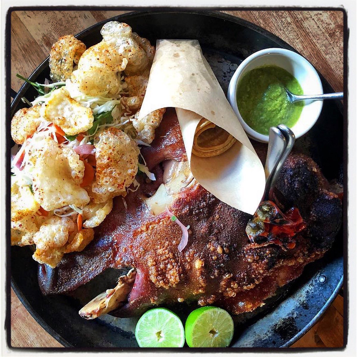 cockscomb_sf's tweet photo. Wood Oven Roasted Pig’s Head, Mexico City style, cabbage, chicharrones, tomatillo salsa, corn tortillas &amp; lime > #SharedSupper #KnowYourChef #CockscombSF https://t.co/ecqU6M0RfP