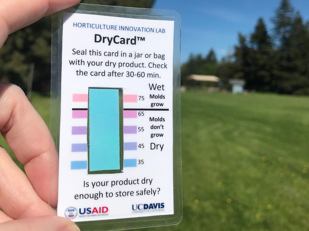 close up on DryCard outside - shows blue "dry" indicator with color-based dryness index. "Is your product dry enough to store safely?"