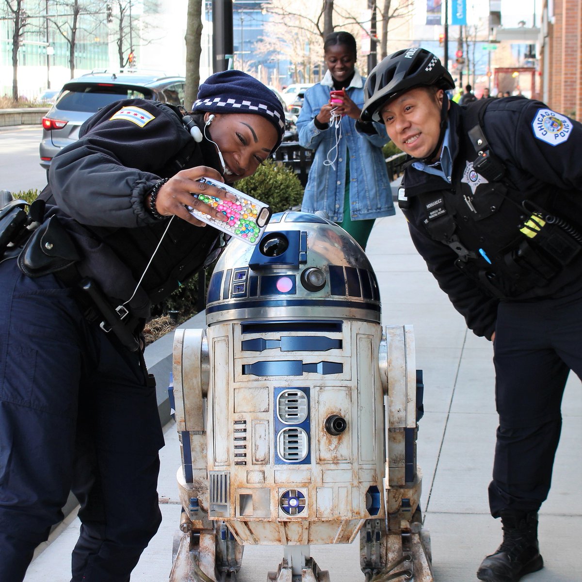 Our friends at the <a href="/Chicago_Police/">Chicago Police</a> hanging out with super special guest, #R2D2. Swing by and you might just catch 'em rolling around our lobby! #StarWars #StarWarsCelebration
