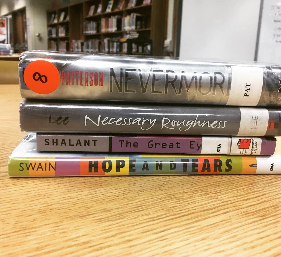 JRMSLibrary's tweet image. Ms. Parent’s second block seemed to have fun creating book spine poetry #poetrymonth @HenricoSchools @hcpslib @JohnRolfeMS @DrJackson_EDU