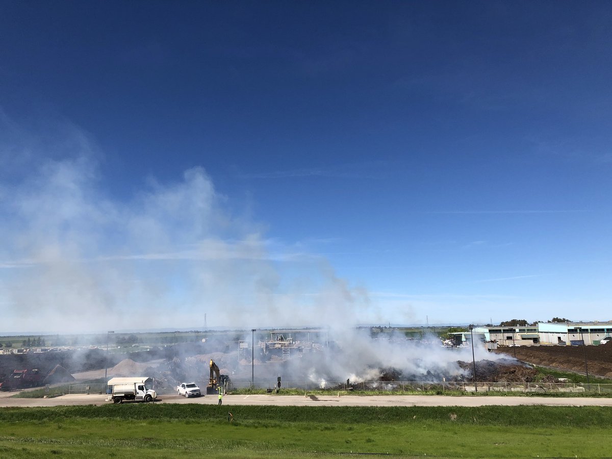 A green waste fire burns at the Materials Recovery Facility bear Roseville, California, April 12, 2019.