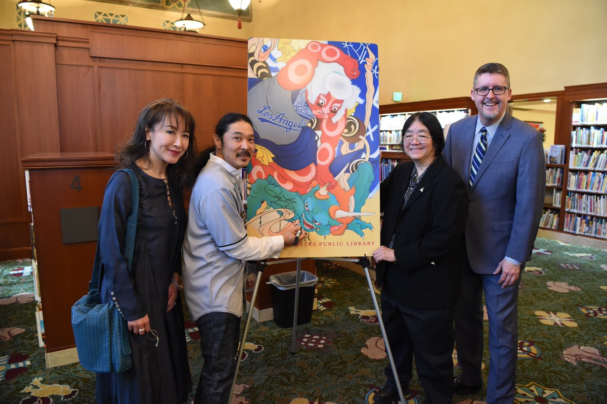 group photo with giant library card