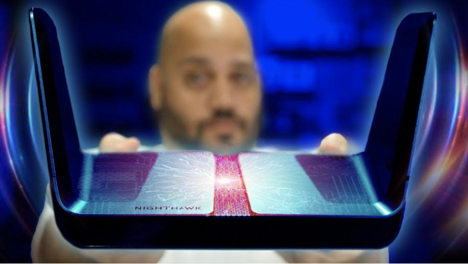 NETGEAR's tweet photo. Is your WiFi outdated? @AndruEdwards from @GearLive takes an in-depth look at the #NighthawkAX8 and discusses why it might be time to upgrade to a #WiFi6 router. Watch the full review here: https://t.co/jOMlvaklMC #NETGEAR #NighthawkRouter #NETGEARWiFi6 #AX https://t.co/VYh9slApDX