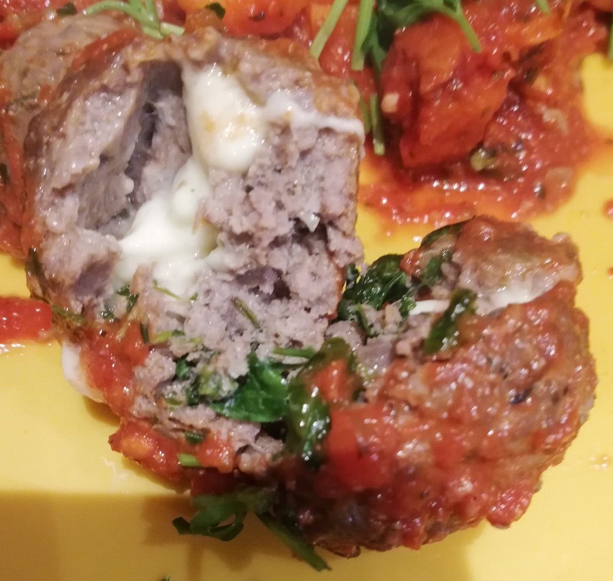 My first effort at a cheese stuffed meatballs in a rich tomato sauce. Luckily it tastes better than it looks.