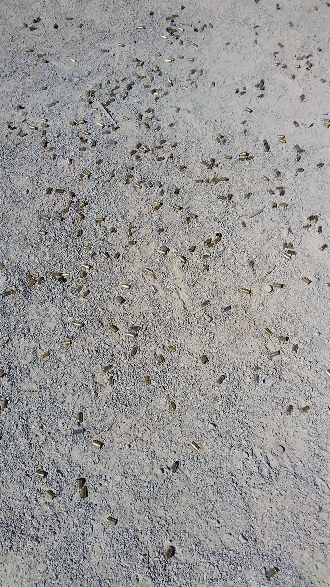 BlueSpringsPD's tweet photo. And so the training day ends, brass on the ground means two things: fun was had by all and gotta pick it up! #rangedayfun https://t.co/eWmUrF6Ful