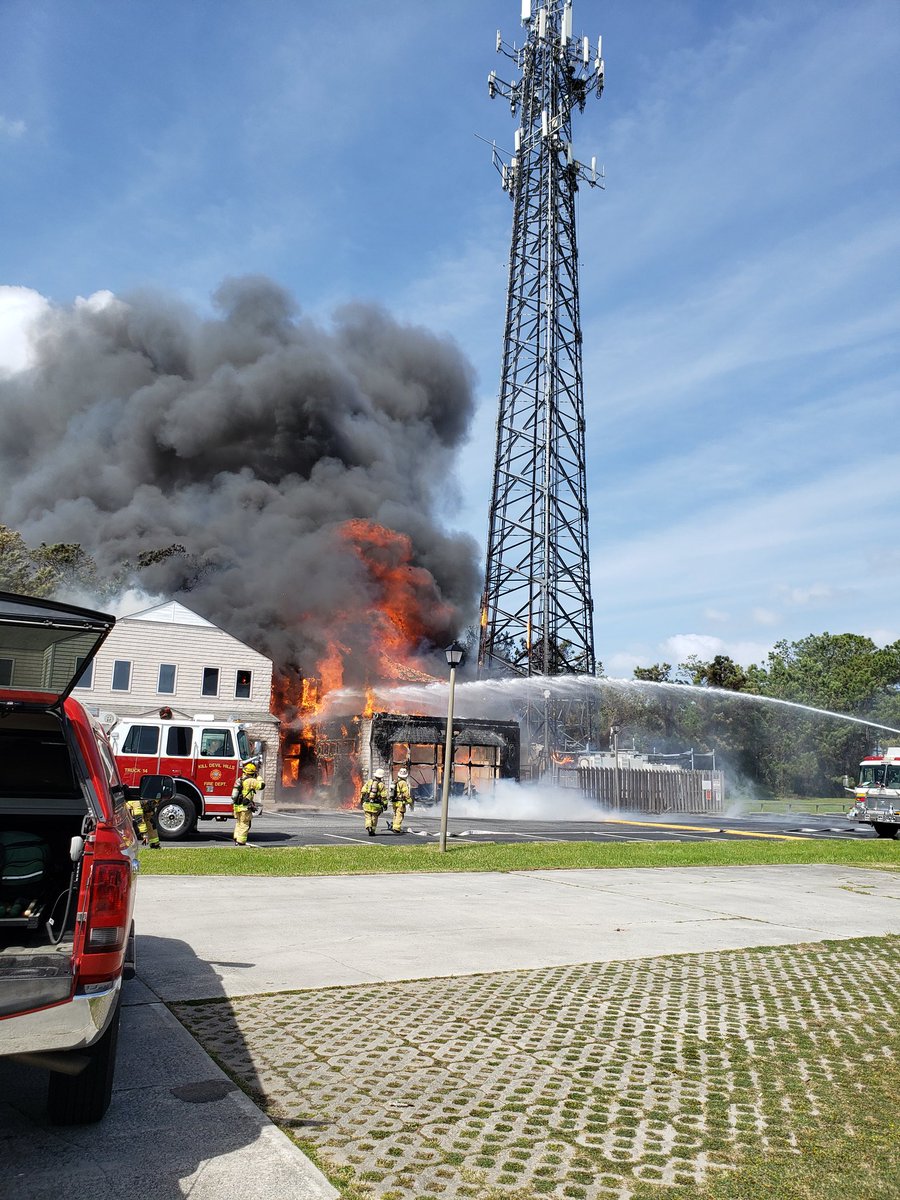 ECFFA's tweet photo. Nags Head FD.(Dare Co) 2nd alarm. Commercial 2 story with heavy fire approx 14:20. In overhaul now. https://t.co/JKq8gBvQF0